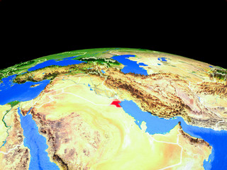 Kuwait on model of planet Earth with country borders and very detailed planet surface.