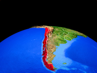 Chile on model of planet Earth with country borders and very detailed planet surface.