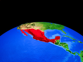 Mexico on model of planet Earth with country borders and very detailed planet surface.