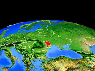 Moldova on model of planet Earth with country borders and very detailed planet surface.