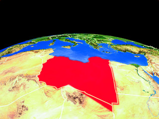 Libya on model of planet Earth with country borders and very detailed planet surface.