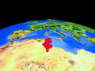 Tunisia on model of planet Earth with country borders and very detailed planet surface.