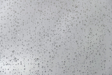 glass and rain drops, raindrops on glass, a nice way raindrops on glass,rain drops on natural real glass,