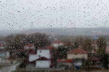 glass and rain drops, raindrops on glass, a nice way raindrops on glass,rain drops on natural real glass,