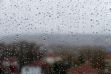 glass and rain drops, raindrops on glass, a nice way raindrops on glass,rain drops on natural real glass,