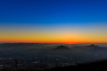Orange, Yellow, Blue Sunset above Mountains