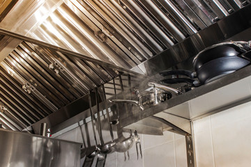 Exhaust systems, hood filters detail in a professional kitchen