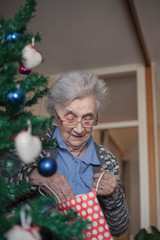 Senior woman enjoying in winter holidays .