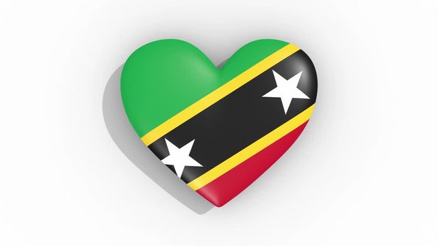 Heart in colors flag of Saint Kitts and Nevis pulses, loop.