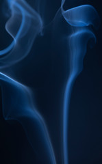Abstract blue smoke swirls