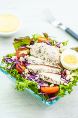 Grilled chicken breast and meat salad