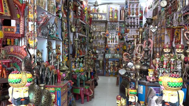 Gift shop in city Pushkar, Rajasthan, India. Souvenirs for sale for tourists, establishing shot