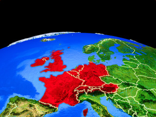 Western Europe on model of planet Earth with country borders and very detailed planet surface.