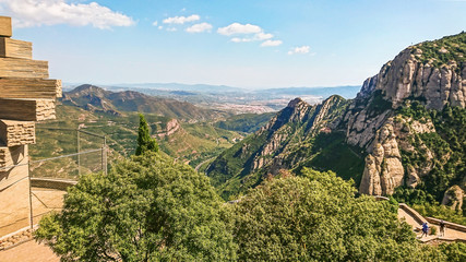 Fototapeta na wymiar Fragment of the mountain of Montserrat, view down from the mountain and on the observation deck. Location: 50 km from Barcelona, Spain.