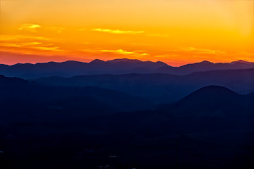 Fototapeta na wymiar Layers of Mountains at Sunset