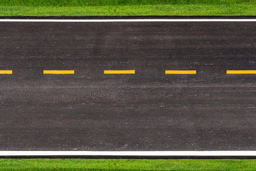 Asphalt road with marking lines white stripes texture Background