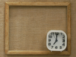 clock on linen background with copy space for your text