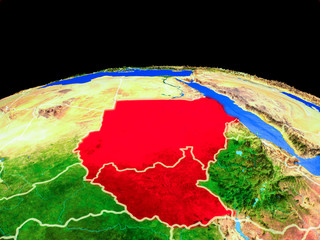 Former Sudan on model of planet Earth with country borders and very detailed planet surface.