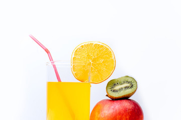 different fruit and juice or smoothie in a glass
