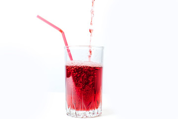 different fruit and juice or smoothie in a glass
