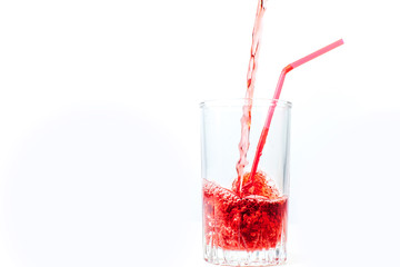 different fruit and juice or smoothie in a glass