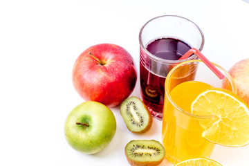 different fruit and juice or smoothie in a glass