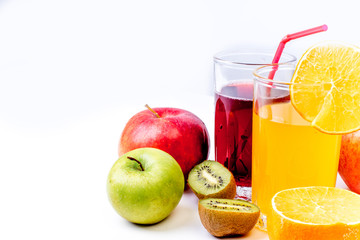 different fruit and juice or smoothie in a glass