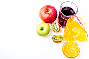 different fruit and juice or smoothie in a glass