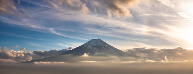 Mountain Fuji in sea of mist or fog at sunrise with cloudy sky, Fujikawaguchiko, Yamanashi, Japan. - obrazy, fototapety, plakaty