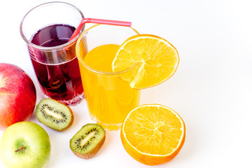 different fruit and juice or smoothie in a glass