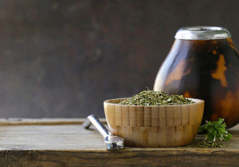 Traditional yerba mate tea in calabash mug and bombilla