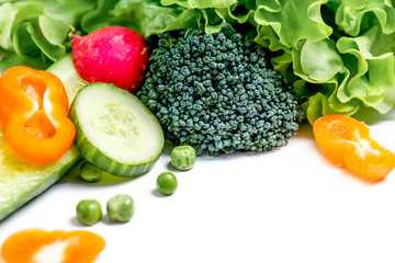 a fresh group of vegetables on white background