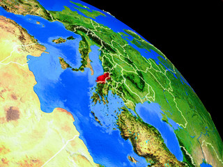 Albania on planet Earth from space with country borders. Very fine detail of planet surface.