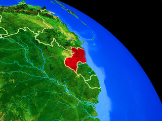 Guyana on planet Earth from space with country borders. Very fine detail of planet surface.