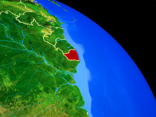 French Guiana on planet Earth from space with country borders. Very fine detail of planet surface.