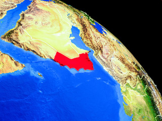 Oman on planet Earth from space with country borders. Very fine detail of planet surface.