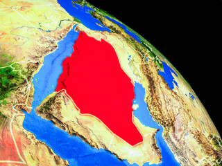 Saudi Arabia on planet Earth from space with country borders. Very fine detail of planet surface.
