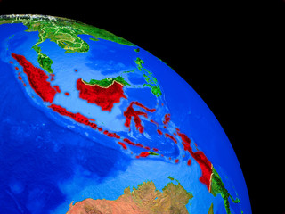 Indonesia on planet Earth from space with country borders. Very fine detail of planet surface.