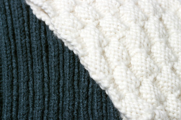 Fototapeta na wymiar Knitted white and blue surface texture, a winter background, a small pattern