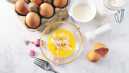 Yolk egg in glass bowl sets up with fresh ingredient