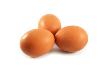 fresh eggs three / egg brown from the farm isolated on white background