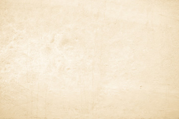 Art concrete or stone texture for background in black, brown and cream colors. Cement and sand wall of tone vintage.