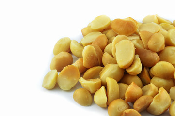 Macadamia nuts isolated on white background / Organic salted macadamia nuts roasted with salt