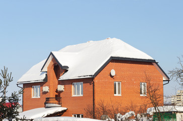 Red brick house in winter time