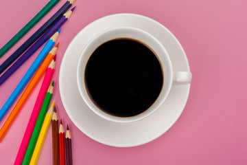 Pencil crayon on a bright pink background. Art concept