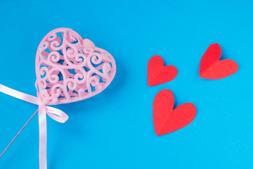 pink heart with little red hearts on blue background, Valentine's day, background for Valentine's day