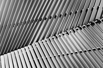 Abstract close-up view of modern silver ventilated on building