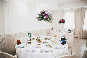 Interior of a restaurant prepared for wedding ceremony