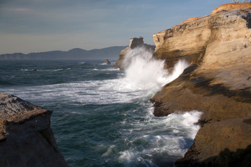 waves crashing on rocks