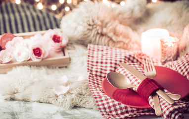 Valentine's Day festive dinner on a wooden background cutlery